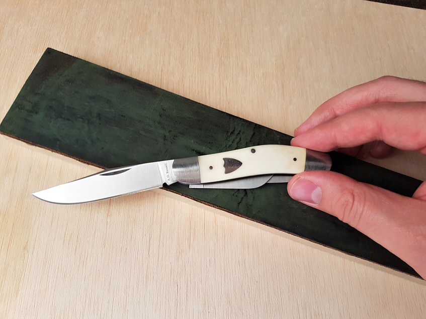 Finishing Paddle with Stockman knife pictured
